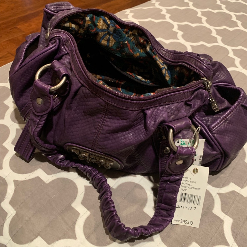 Brand new Kathy Van Zeeland purse with tags!